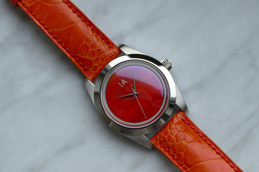 L'Artisan Phoenix (Orange Agate Stone Dial)