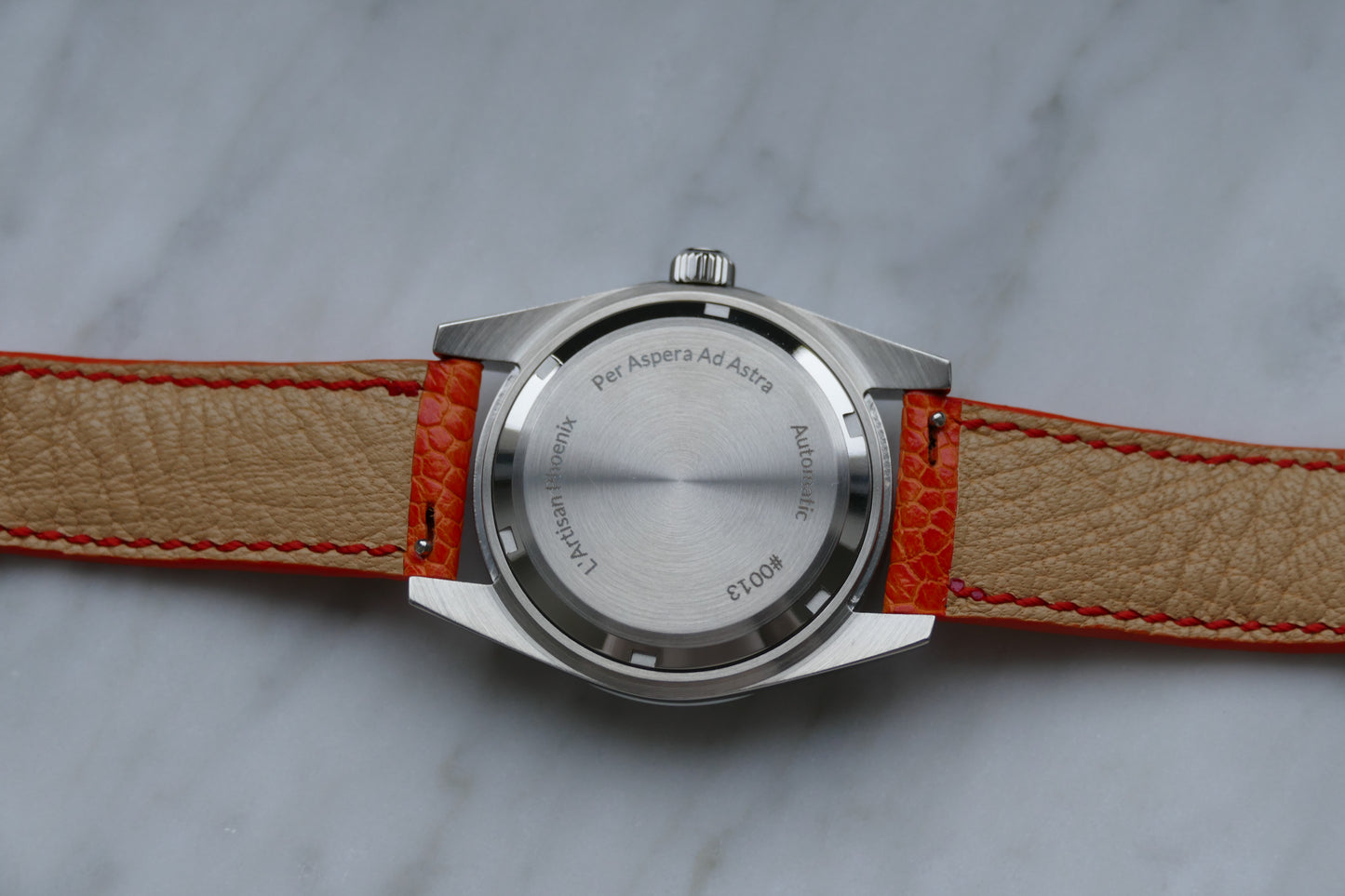 L'Artisan Phoenix (Orange Agate Stone Dial)